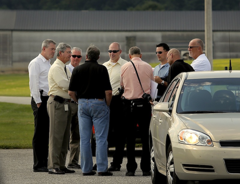 State police investigators and Deputy Attorney General William Stokes met with officials from Moark Egg Farm at its Turner location Tuesday, August 20, 2013, after a man was accidentally shot and killed by a contractor who was shooting rodents and stray chickens.