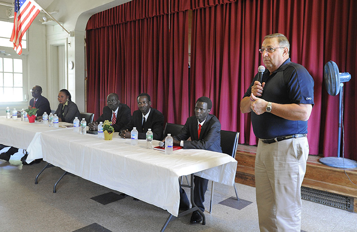Gov. Paul LePage speaks to members of the Sudanese community at Trinity Episcopal Church in Portland on Friday.