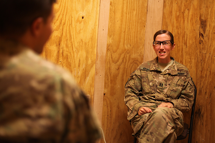 In Afghanistan, the most experienced soldiers, redeployed to do the job of wrapping up the U.S. mission, also are coping with high levels of post-traumatic stress. Capt. Stacey Krauss, a U.S. Army psychologist, speaks with a soldier this month at Forward Operating Base Arian, Afghanistan.