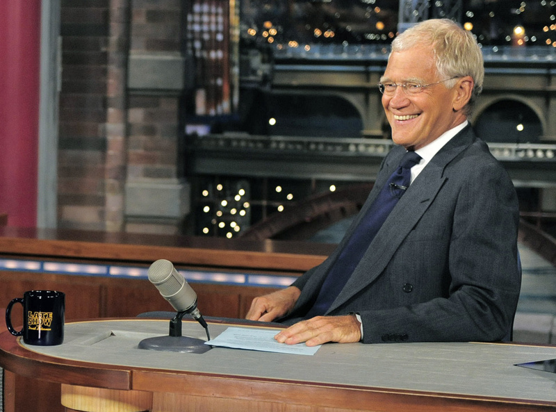 Host David Letterman, shown on the set of "Late Show with David Letterman" in July, marks 20 years with CBS.
