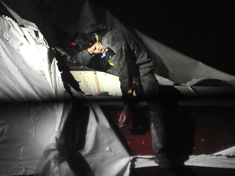 Boston Marathon bombing suspect Dzhokhar Tsarnaev leans over in a boat at the time of his capture by law enforcement authorities on April 19 in Watertown, Mass.