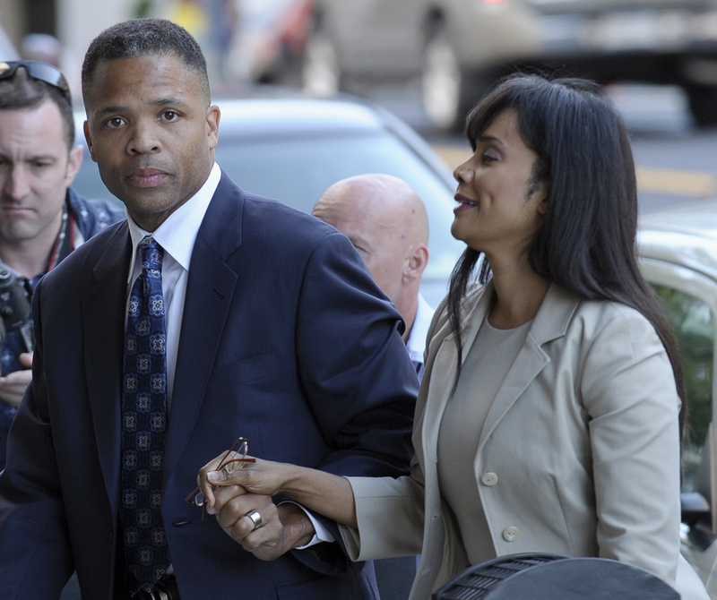 Former Illinois Rep. Jesse Jackson Jr. and his wife, Sandra, arrive at federal court in Washington on Wednesday.