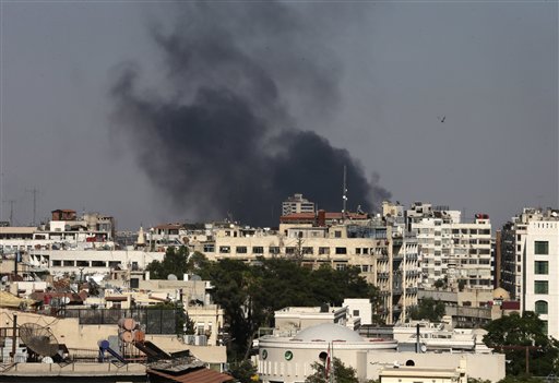 Columns of smoke rise from heavy shelling in the Jobar neighborhood, east of Damascus Sunday. Syria reached an agreement with the United Nations to allow a U.N. team of experts to visit the site of alleged chemical weapons attacks last week outside Damascus, state media said.