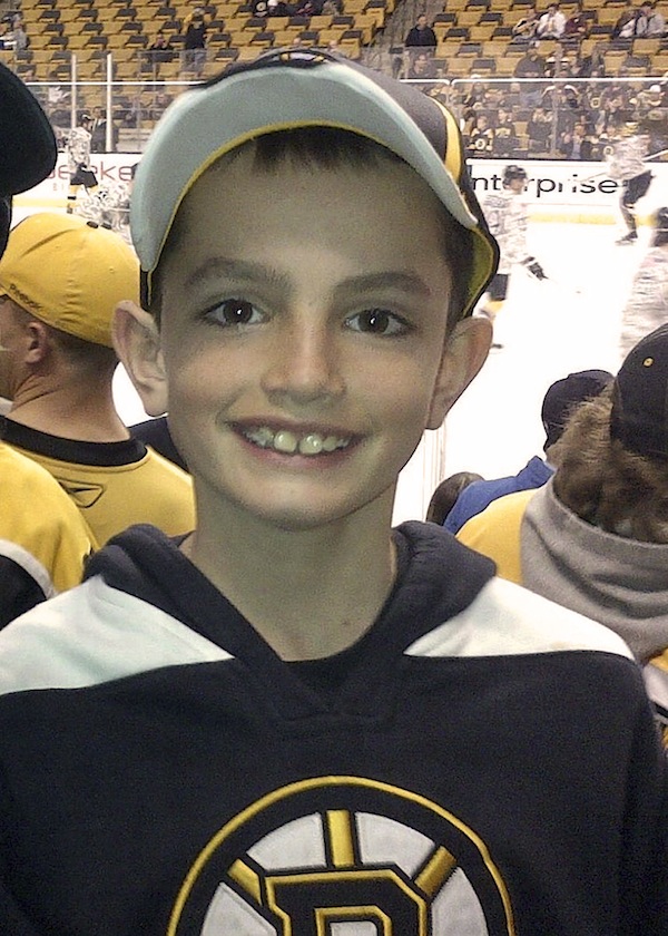 This April 11, 2013 photo provided by the Richard family shows, Martin Richard, 8, in Boston, the youngest of three people killed in the bombings, Monday, April 15, 2013, near the finish line of the Boston Marathon.The family of Martin and his sister Jane, 7, who lost part of her left leg in the blast, released a photo Thursday, Aug. 15, 2013 showing her walking on a prosthetic leg, and said in a statement that she is already dancing and “struts around on it with great pride.” (AP Photo/Bill Richard, File)