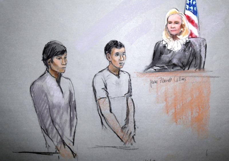 This courtroom sketch of May 1, 2013 by artist Jane Flavell Collins shows defendants Dias Kadyrbayev, left, and Azamat Tazhayakov appearing in front of Federal Magistrate Marianne Bowler at the Moakley Federal Courthouse in Boston. The two college friends of Boston Marathon bombing suspect Dzhokhar Tsarnaev have been indicted Thursday, Aug. 8, 2013 on obstruction conspiracy charges. Dias Kadyrbayev and Azamat Tazhayakov are accused of trying to dispose of evidence from Dzhokhar Tsarnaev's dorm room. The two 19-year-olds have been detained since they were initially charged in May. If convicted, they face up to 20 years in prison. (AP Photo/Jane Flavell Collins)