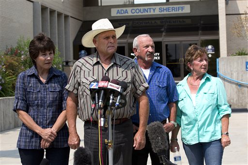 Standing in front of the Ada County Sheriff's Office in Boise, witnesses, from left to right, Mary Young, Mike Young, Mark John and Christa John speak with news reporters Sunday about their sighting of Hannah Anderson and James DiMaggio at Morehead Lake.