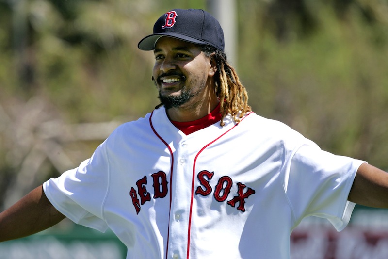In this 2006 file photo, Boston Red Sox' Manny Ramirez looks over toward to fans prior to the start of a preseason baseball game. Ramirez was released from his minor-league deal by the Texas Rangers on Tuesday, Aug. 13, 2013. (AP Photo/Jim Mone) Baseball