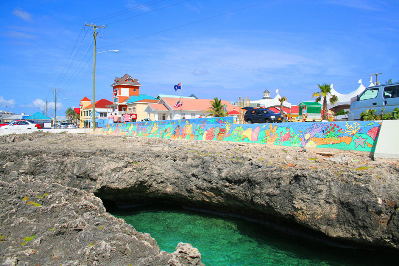 A file photo of a waterfront street in George Town, Cayman Islands. The Cayman Islands says it has reached agreement with the United States to provide information on accounts held by American citizens to comply with a sweeping U.S. law designed to combat tax evasion.