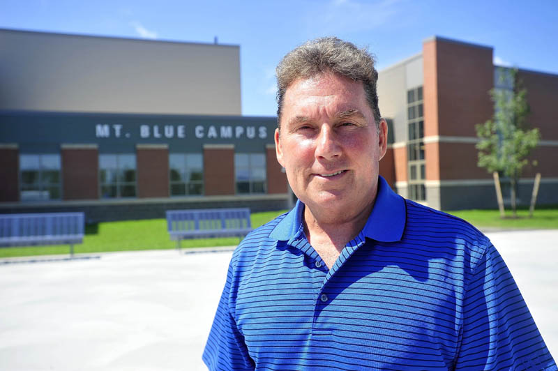 Tom Ward, superintendent of the Mt. Blue School District, stands outside the front entrance to the newly renovated Mt. Blue Learning Campus on Seamon Road in Farmington today.