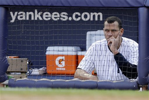 In this Oct. 14, 2012, photo, New York Yankees' Alex Rodriguez sits in the dugout after striking out in Game 2 of the American League championship series against the Detroit Tigers in New York.