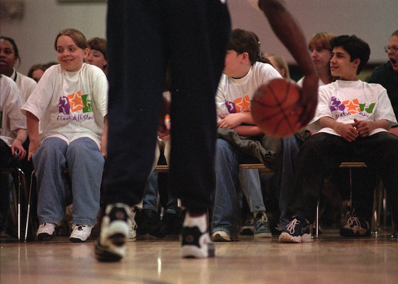 In this 1997 file photo, Lincoln Middle School students participate in a basketball skills demonstration. After budget cuts, the Portland school district’s middle school athletic directors and coaches are stepping up to save their schools’ seventh-grade field hockey as well as girls' and boys' basketball and soccer teams. (AP Photo / Carl D. Walsh)