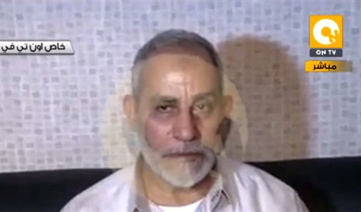 In this image taken from Egypt State TV, Mohammed Badie, the supreme leader of the Muslim Brotherhood, is seen after being detained by Egyptian security in Cairo on Tuesday. Badie had been in hiding near the huge sit-in in support of the country's ousted Islamist president, which security forces violently dispersed a week ago, leaving hundreds dead.