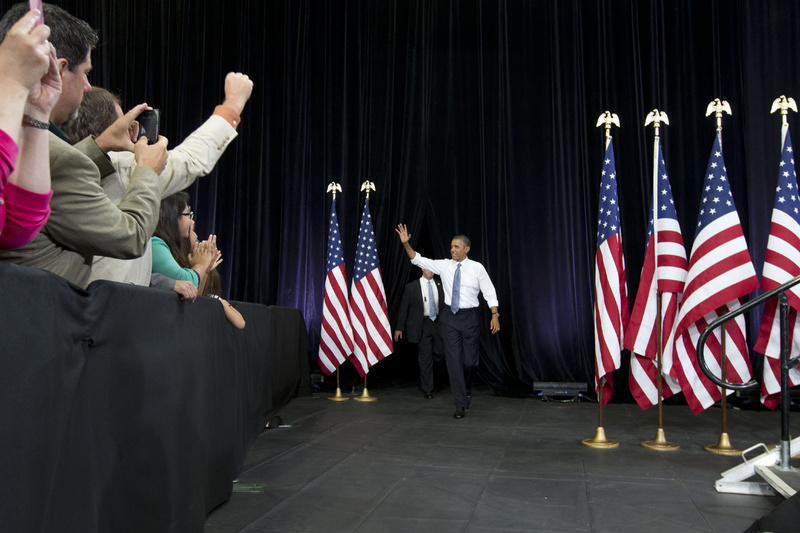 President Barack Obama waves to the crowd as he arrives to speak about housing Tuesday at Desert Vista High School in Phoenix. Afterward, the president headed to Los Angeles to appear on "The Tonight Show with Jay Leno."