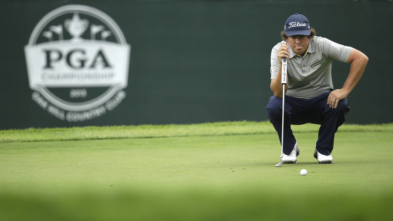 Jason Dufner lines up a putt on the eighth hole during the second round of the PGA Championship golf tournament at Oak Hill Country Club on Friday in Pittsford, N.Y.