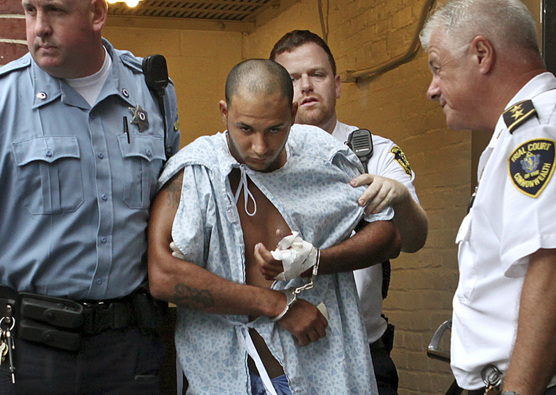 Edwin Alemany is led from district court in Boston after a hearing on July 25. Boston Police said Thursday that Alemany, who was being held in connection with two recent attacks on women, had been charged with the murder of Amy Lord, 24, of Wilbraham, Mass., who was found stabbed to death on July 23 in a Boston park.