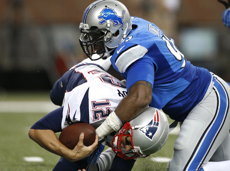 Lions defensive end Jason Jones sacks Patriots quarterback Tom Brady during the second quarter of Thursday’s preseason game in Detroit, won in convincing fashion by the home team.