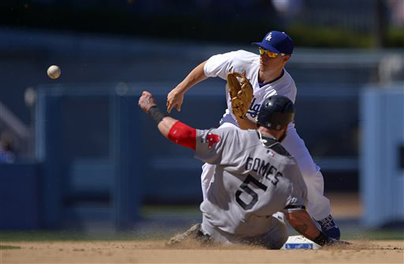 Jonny Gomes of the Red Sox steals second as Dodgers second baseman Mark Ellis takes a late throw from home during the sixth inning Saturday in Los Angeles.