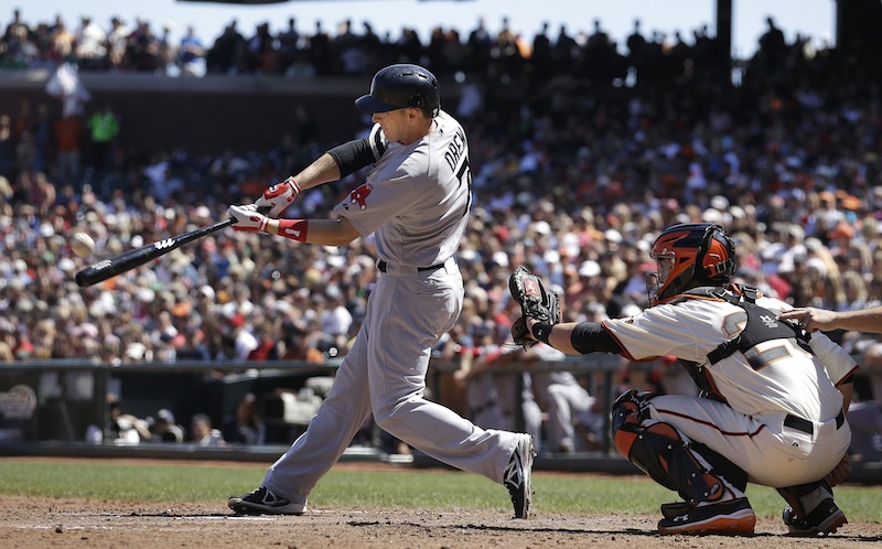 Stephen Drew hits a three-run home run off San Francisco Giants pitcher Michael Kickham during the seventh inning in San Francisco on Wednesday.