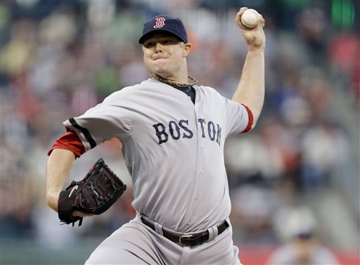 Boston Red Sox starting pitcher Jon Lester throws a pitch during Monday's game against the Giants in San Francisco.