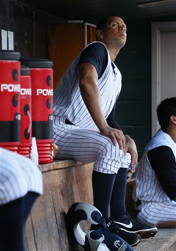 New York Yankees' Alex Rodriguez looks out from the dugout during a Class AA baseball game with the Trenton Thunder against the Reading Phillies on Friday in Trenton, N.J.