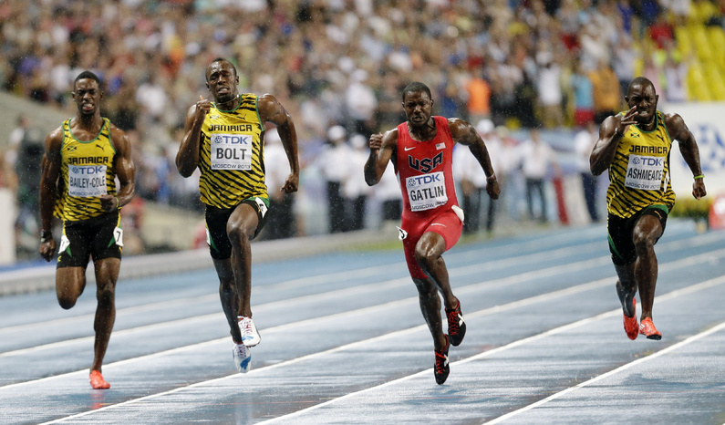 Jamaica's Usain Bolt, second from left, races to victory against Jamaica's Kemar Bailey-Cole, left, USA's Justin Gatlin and Jamaica's Nickel Ashmeade in the Men's 100-meter final at the World Athletics Championships in Moscow, Russia on Sunday.