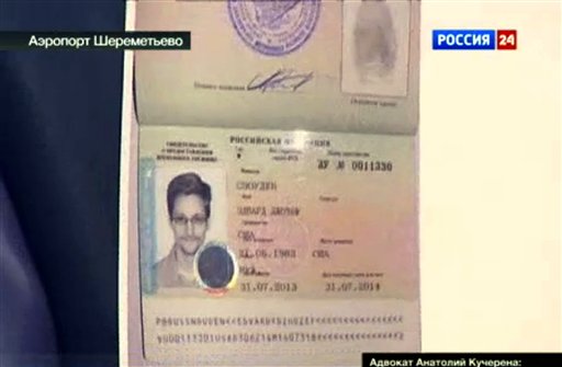 This image taken from Russia24 TV channel shows the document authorizing temporary asylum for Edward Snowden.
