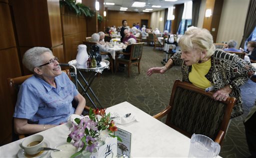 Edith Stern, 92, talks to a new resident in the cafeteria at her retirement home in Chicago. Stern is a "super ager" participating in a Northwestern University study of people in their 80s and 90s. Stern is a vibrant presence at the home, where she acts as a sort of room mother, volunteering in the gift shop, helping residents settle in and making sure their needs are met.