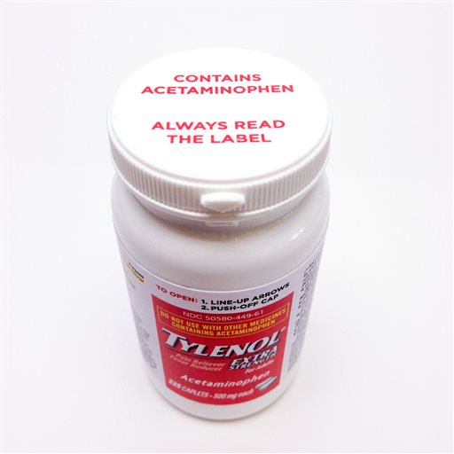 This image provided by Johnson & Johnson shows a bottle of Extra Strength Tylenol bearing a new warning label on the cap alerting users to potentially fatal risks of taking too much of the pain reliever.