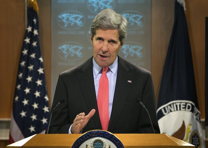 Secretary of State John Kerry gestures during a statement on the ongoing situation in Egypt before the start of a press briefing at the State Department in Washington, Wednesday, Aug. 14, 2013. Kerry said the violence in Egypt is deplorable and is a serious blow to reconciliation efforts. He says it runs counter to Egyptians' aspirations for peace. (AP Photo/Evan Vucci)