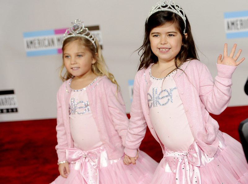The parents of Sophia Grace Brownlee, right, shown with her cousin Rosie Grace McClelland, made a video of her rapping and singing Nicki Minaj's song "Super Bass," which has drug and sexual references. It was deemed "cute" and "adorable" by the video's many viewers on YouTube.