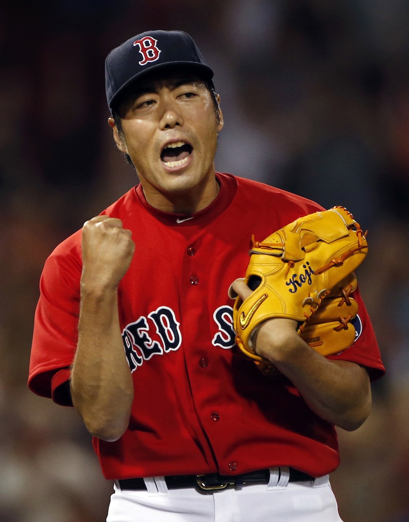 Red Sox closer Koji Uehara celebrates another save after retiring all four batters he faced Friday night in a 4-3 win over the White Sox.