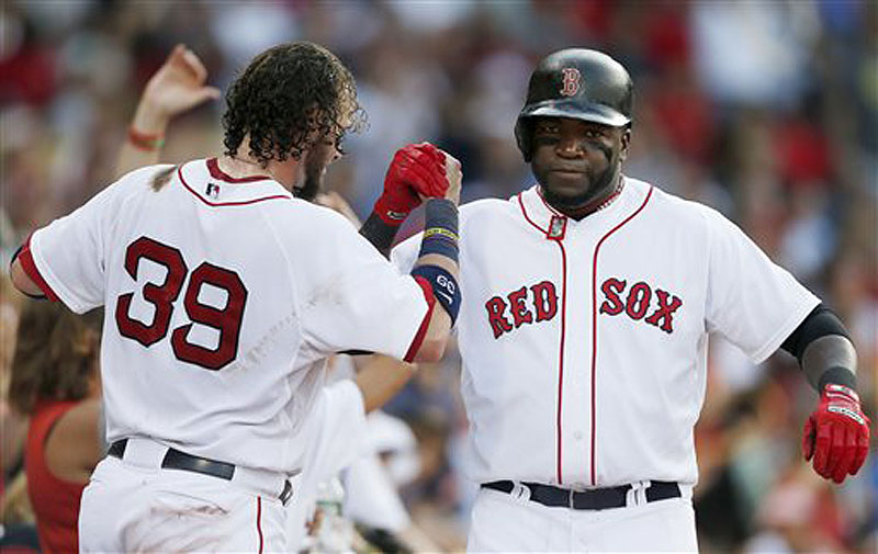 David Ortiz is congratulated by Jarrod Saltalamacchia after hitting a home run in the seventh inning Saturday, helping the Red Sox end a three-game losing streak.