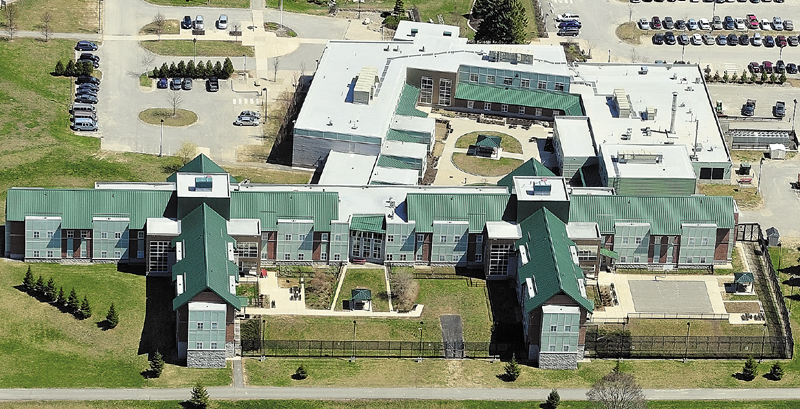 This aerial photo taken on Tuesday April 30, 2013 shows The Riverview Psychiatric Center on banks of Kennbec River in Augusta. The Riverview Psychiatric Center in Augusta is in danger of losing about $20 million in federal funding because the facility is out of compliance with federal guidelines.