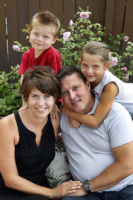 Danielle and Scott Nelson pose with their children, Taylor, 7, back right, and Dane, 3, at their Aliso Viejo, Calif., home on July 3. They are relieved to find Danielle’s pre-existing cancer will be covered, but they have many more questions. 07000000 HTH krtcampus campus krthealth health krtnational national MED krtedonly mct 07013000 HEA health care policy 2013 krt2013