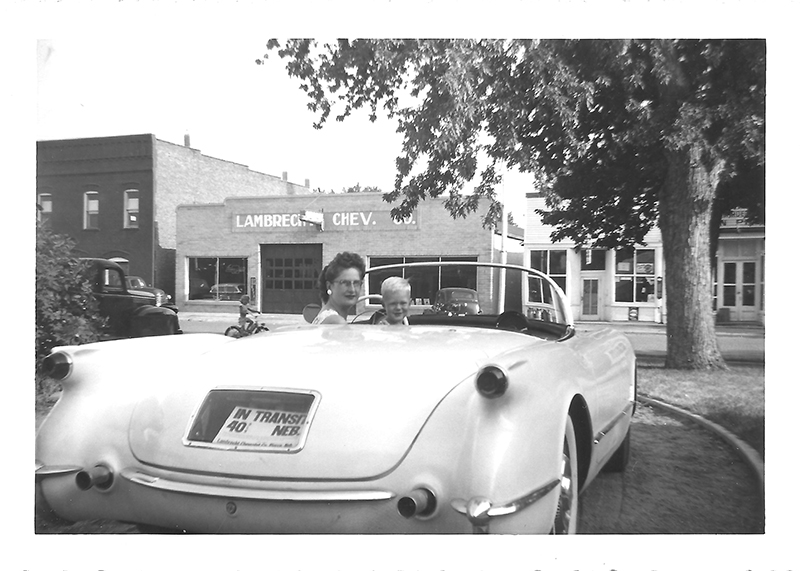 This family photo which was provided by Jeannie Stillwell, daughter of Ray Lambrecht of the Lambrecht Chevrolet car company in Pierce, Neb., shows Mildred Lambrecht, wife of Ray, and their son Mark in a brand new 1953 Corvette, in front of the dealership.
