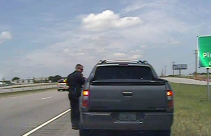 A video provided by the Forney, Texas, police department, shows an officer speaking with George Zimmerman after he was pulled over about 20 miles east of Dallas on Sunday.