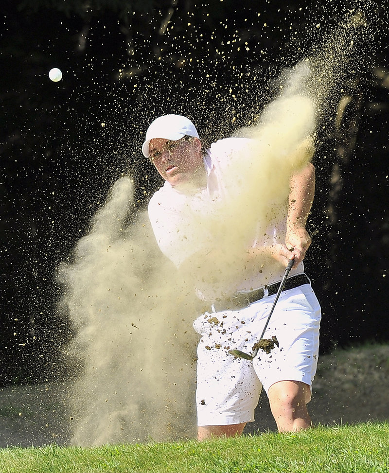 Emily Bouchard blasts out of the bunker on the 16th hole Wednesday on the way to winning the Maine Women’s Amateur at the Brunswick Golf Club. Bouchard won by six strokes.