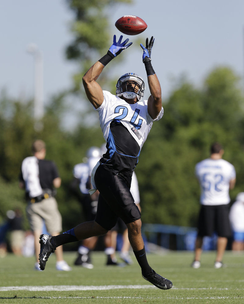 Defensive back Chris Hope of the Detroit Lions pulls down a pass Wednesday during a training-camp drill at Allen Park, Mich.