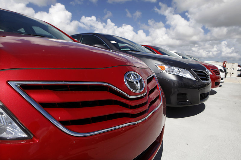 A Toyota Camry LE sits on the lot at Kendall Toyota in Miami. General Motors, Ford, Chrysler, Toyota and Nissan all reported double-digit sales gains in July 2013, signs that U.S. auto sales will remain strong into the second half of the year.