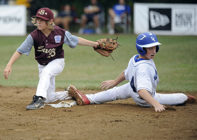 Timmy Smith of Saco has the ball and the bag, forcing Zeke O’Connell of Newton, Mass., at second base.