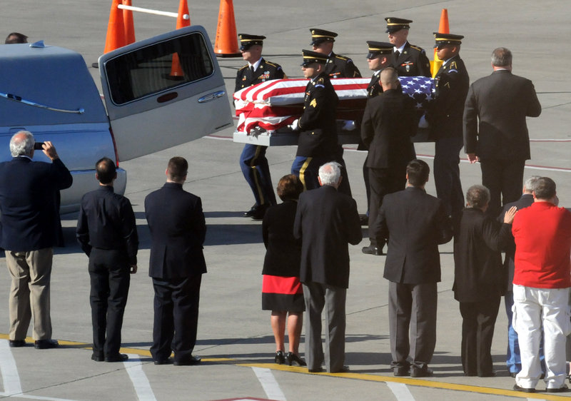 The remains of Sgt. Dominick J. Licari of Frankfort, N.Y., a member of the Army Air Corps during World War II, arrive at the Albany International Airport on Friday afternoon.