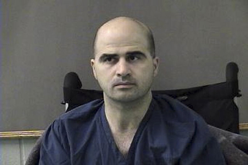The defendant, Maj. Nidal Malik Hasan, was shot in the rampage and is paralyzed from the abdomen down.