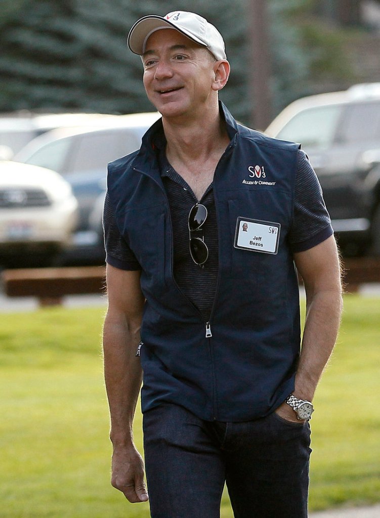 Jeff Bezos arrives for the first session of the annual Allen and Co. conference last month in Sun Valley, Idaho. Bezos plans to keep his “day job” as CEO of Amazon.com.