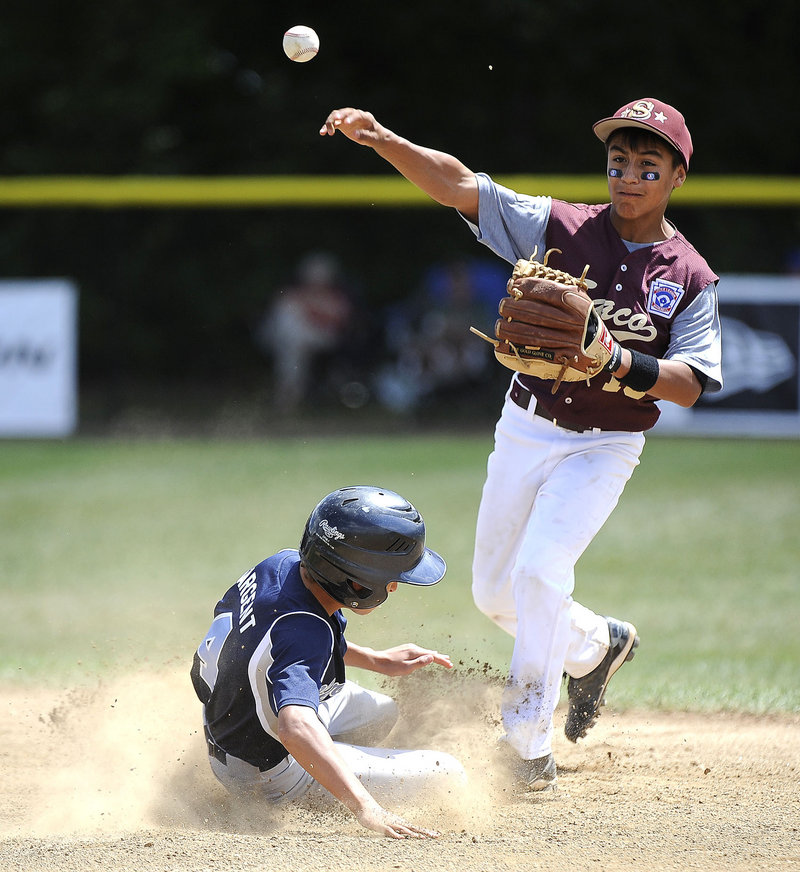 Anthony Bracamonte of Saco forces Ryan Sargent of South Burlington, Vt., at second base Tuesday during their Little League regional game. South Burlington reached the semifinals and Saco still harbors hopes.