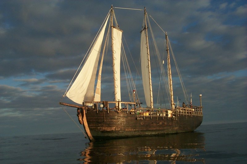 A still provided by documentary filmmaker Gregory Roscoe shows the galleon Raw Faith underway on a calm sea.