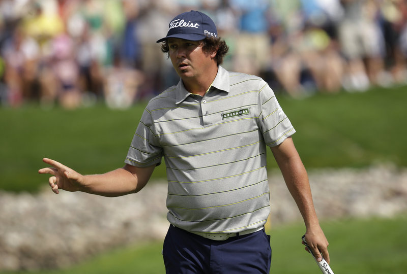 Jason Dufner, stoic as ever, shows little emotion after sinking a birdie putt on the 11th hole during the second round of the PGA Championship at Oak Hill Country Club in Pittsford, N.Y.