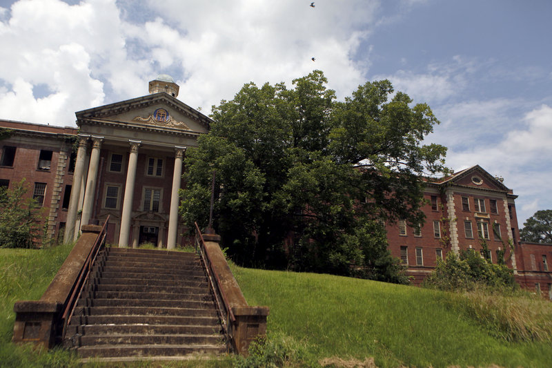 The Jones Building stands in decay on the Central State Hospital campus in Milledgeville, Ga. Locals are working on redeveloping the hospital, which opened in 1842 and once housed 13,000 patients, and its 2,000-acre campus.