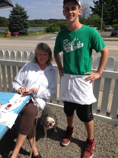 Martha Stewart, one of Maine’s best known residents, visited Bob’s Clam Hut in Kittery Thursday with one of her prized pups. The employee serving her is Chris Cambridge.