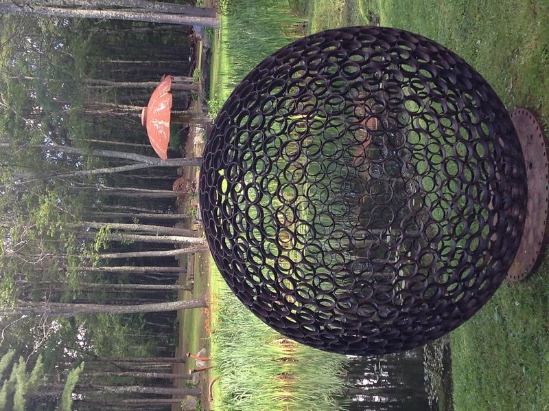 Jay Sawyer has dotted his property in Warren with the sculptures that he creates from salvaged materials, including “Samosphere IV: A Space for The Spirit."