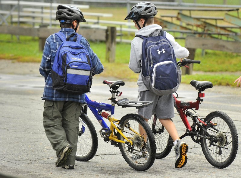 Wearing a helmet, as these two students at Lyseth School in Portland are doing, is one way bike riders can ensure their safety, a reader says.